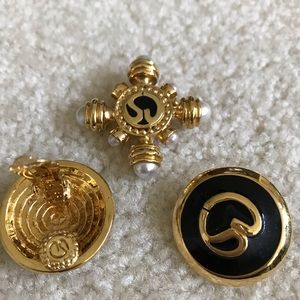 St. John’s black and gold earrings and pin.
